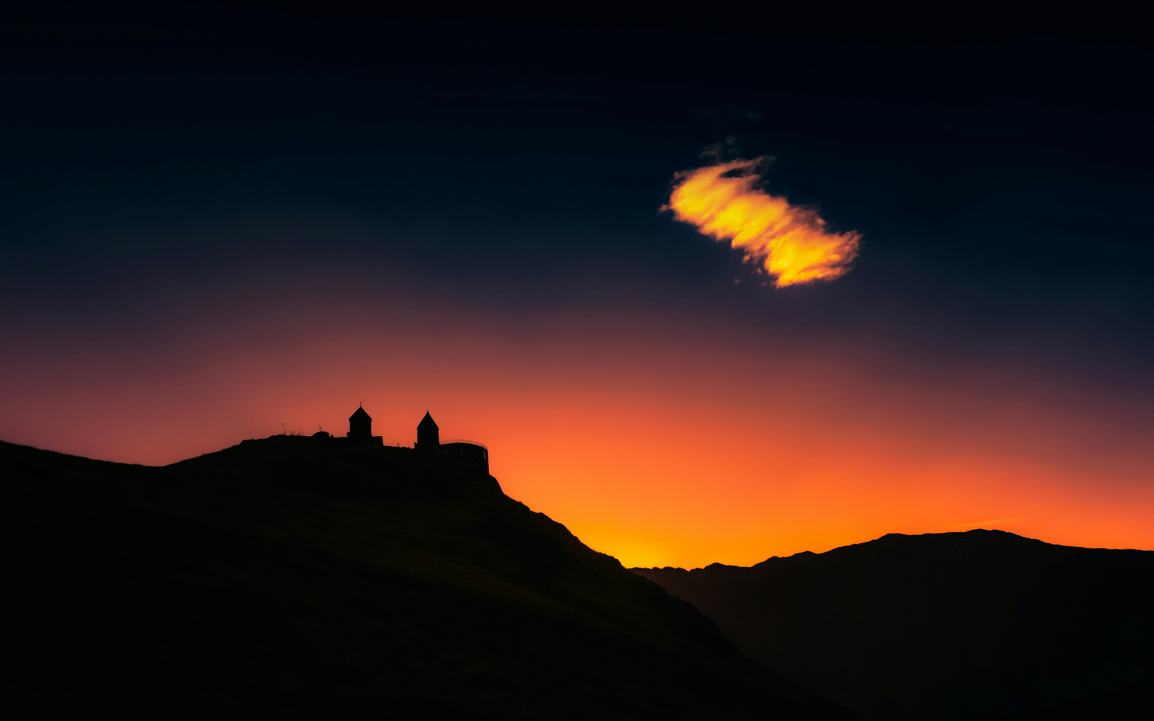 silhouette of mountain during sunset